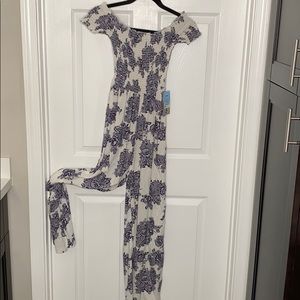 white pantsuit with blue flower detailing